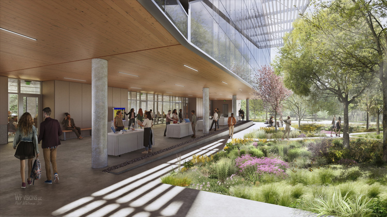 A modern building at Northwest Vista College with a spacious, glass-walled lobby and an adjacent garden filled with various plants and flowers. This State-of-the-Art STEM Learning Center sees people walking and sitting both inside the lobby and outside in the garden area.