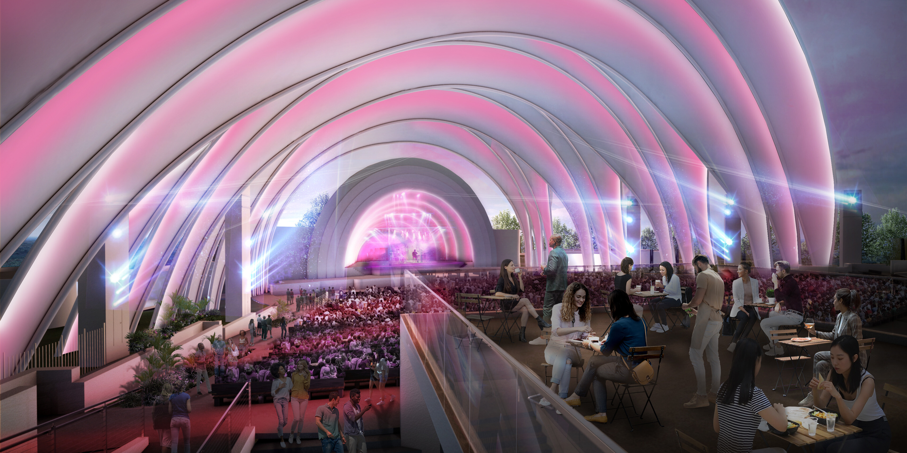 A modern, arched concert venue with pink lighting at Fair Park, featuring seated guests dining in the foreground and an audience facing the stage in the distance.