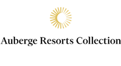 Yellow and gold emblem with sun rays above the words "Resorts World Las Vegas" in black text, reminiscent of the elegance found at Stanly Ranch, Auberge Resorts' luxury resort.