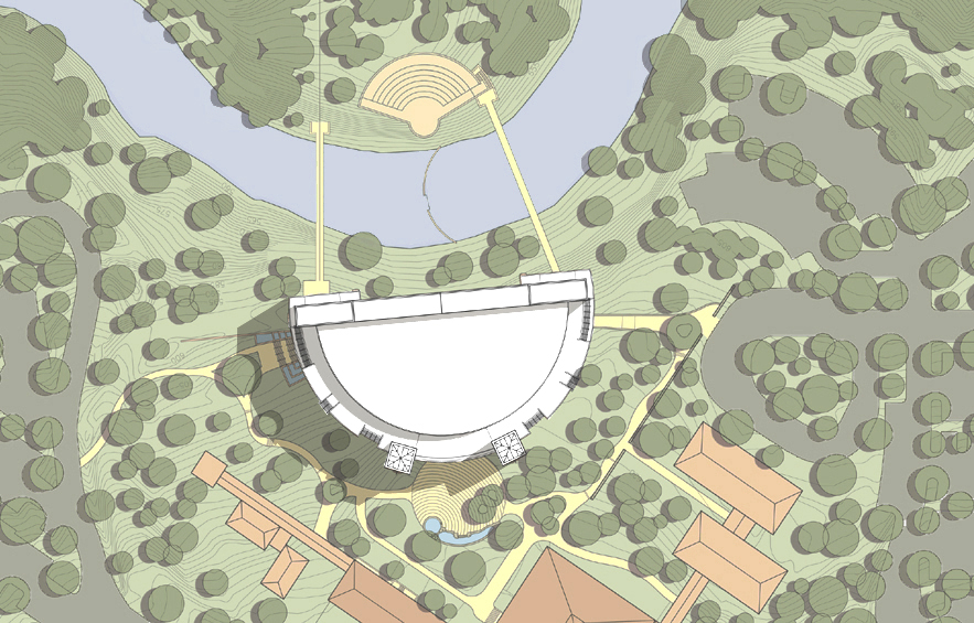 An aerial view captures the outdoor amphitheater of the Riverbend Church, gracefully surrounded by trees. Winding pathways lead you to a serene seating area nestled by the river.